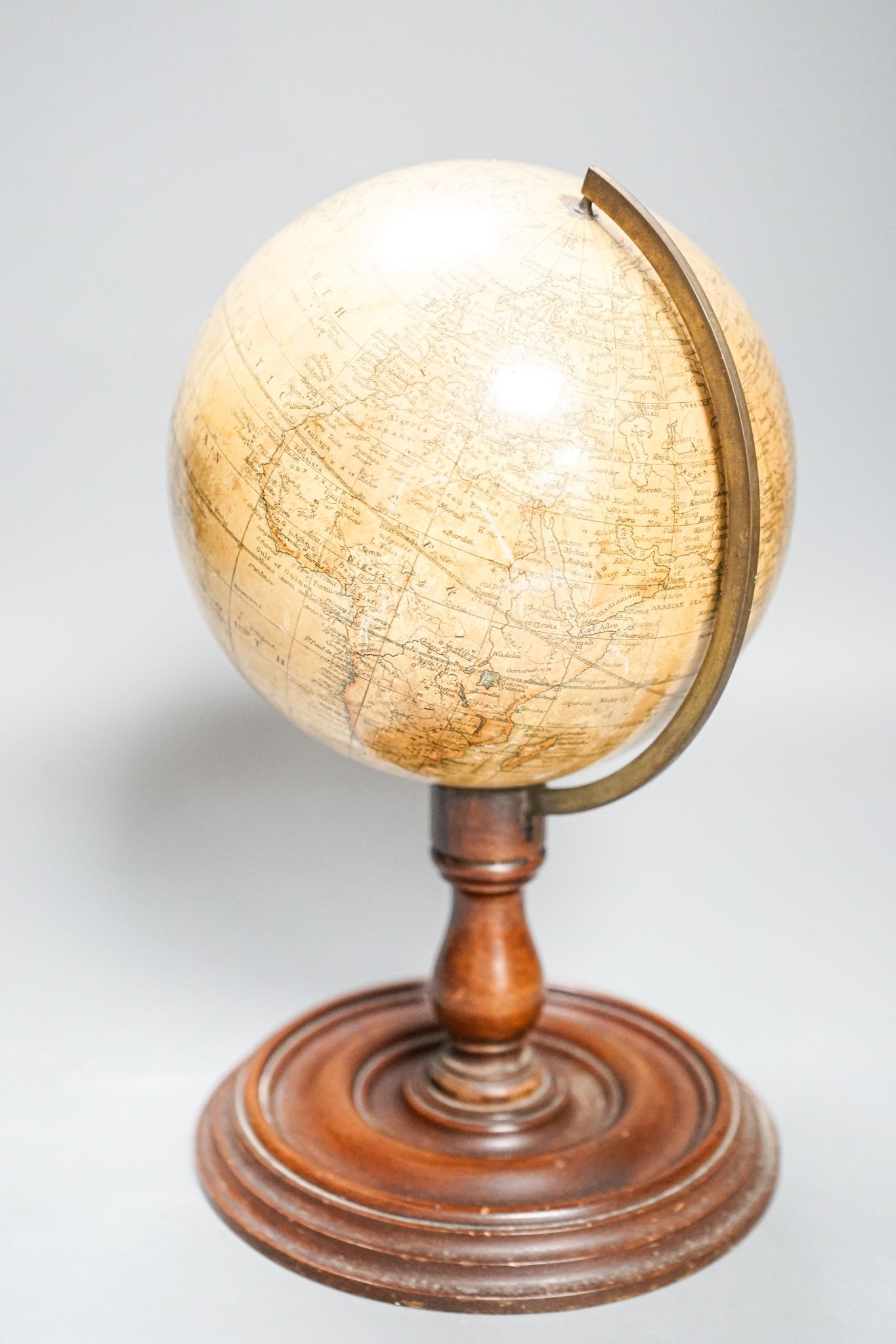 A Victorian Smith’s 5.5in. terrestrial globe, turned mahogany stand, 24cm